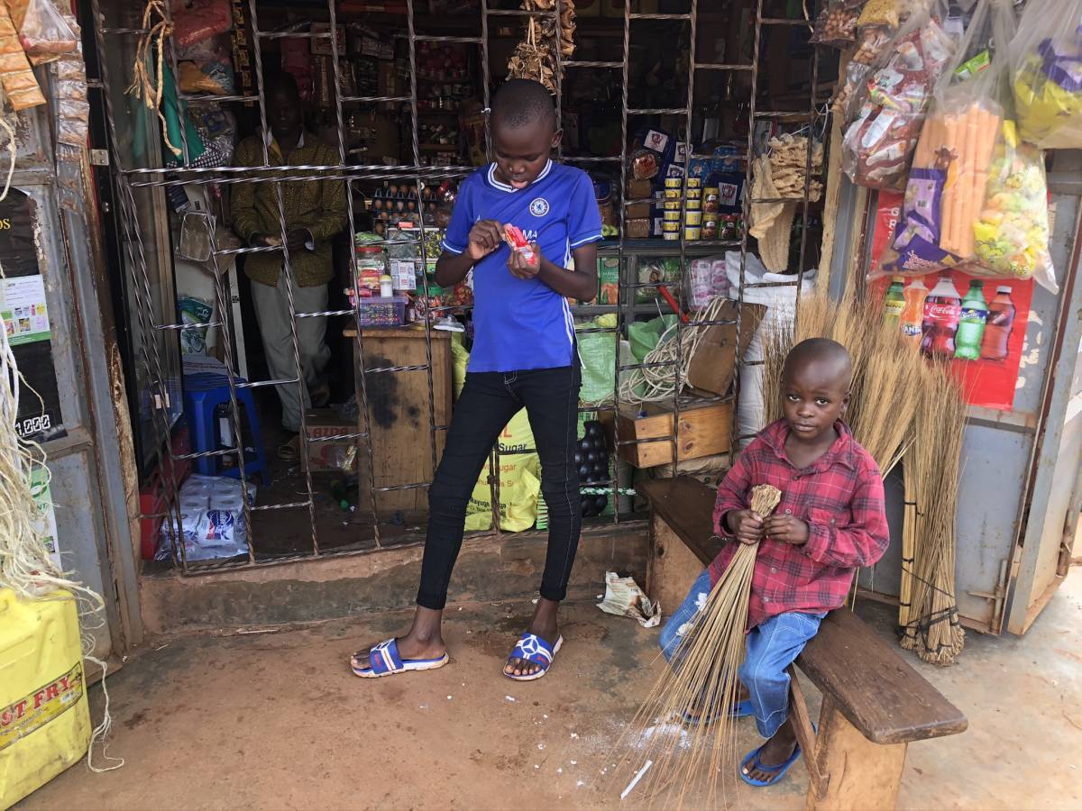 Children in front of a shop in Kazo Kampala